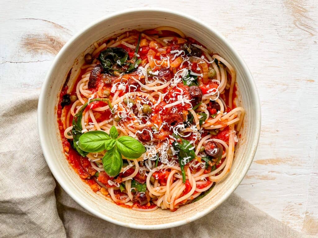Vegan puttanesca sauce with spaghetti