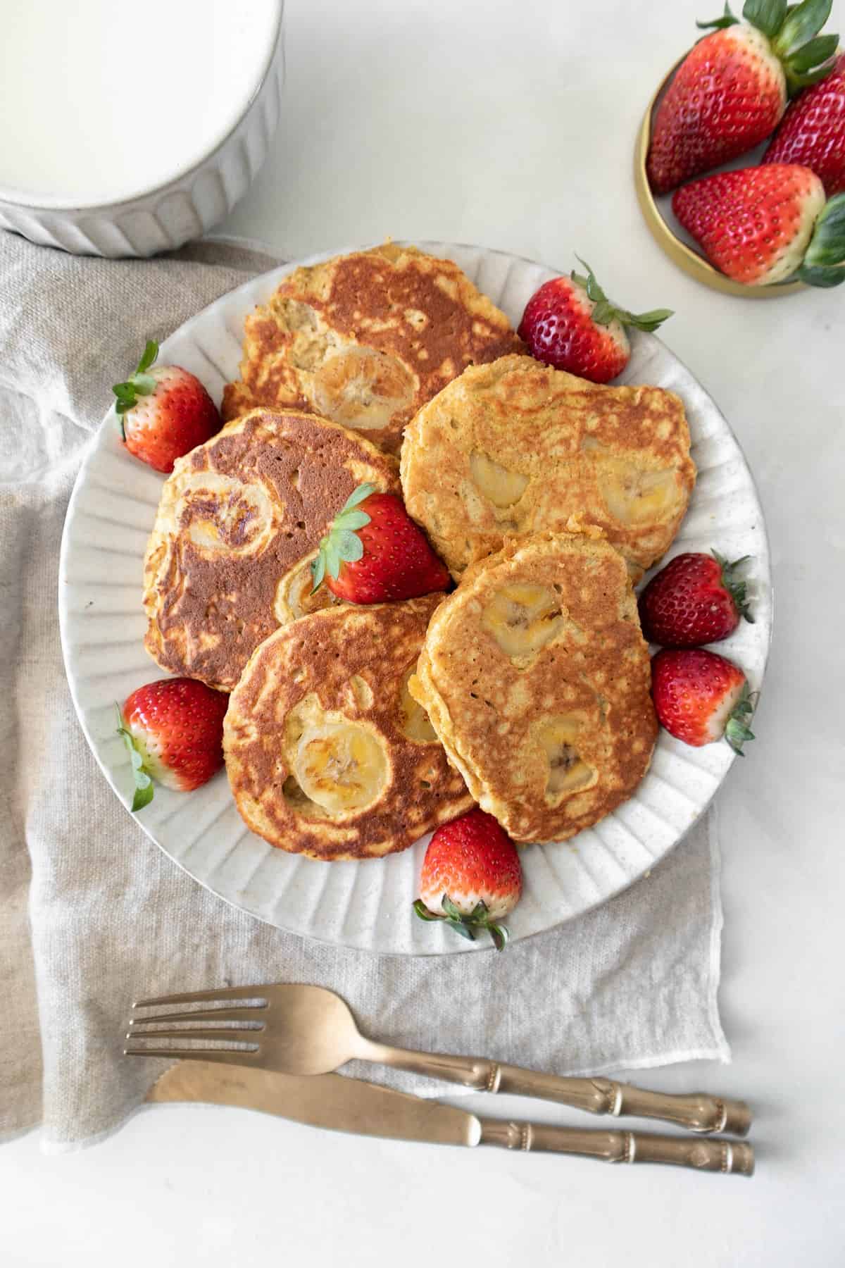 coconut flour banana pancakes with strawberries