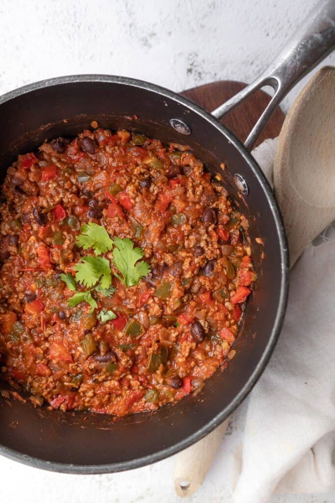 Mexican chili con carne recipe on pot