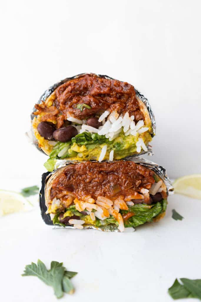 Shredded beef burrito halved and stacked