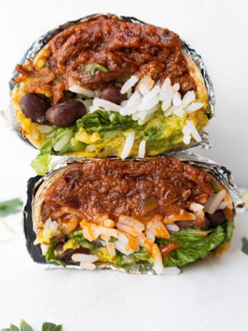 Shredded beef burrito halved and stacked