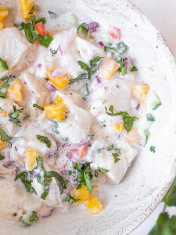 coconut milk ceviche with mango on a bowl