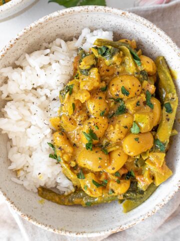 Butter bean curry in a bowl with rice