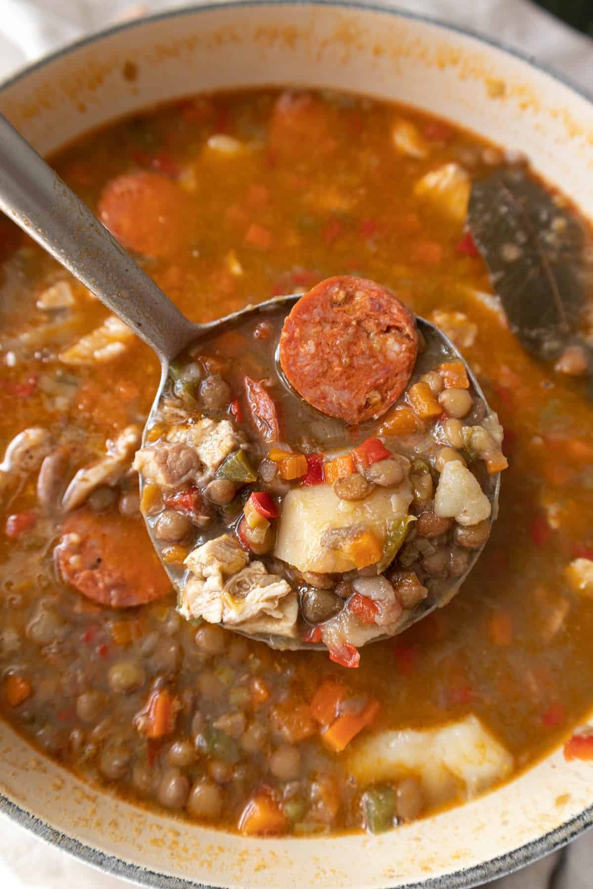 Ladle with spanish lentil stew