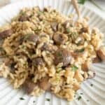 close up photo of mushroom risotto gluten free vegan in a plate