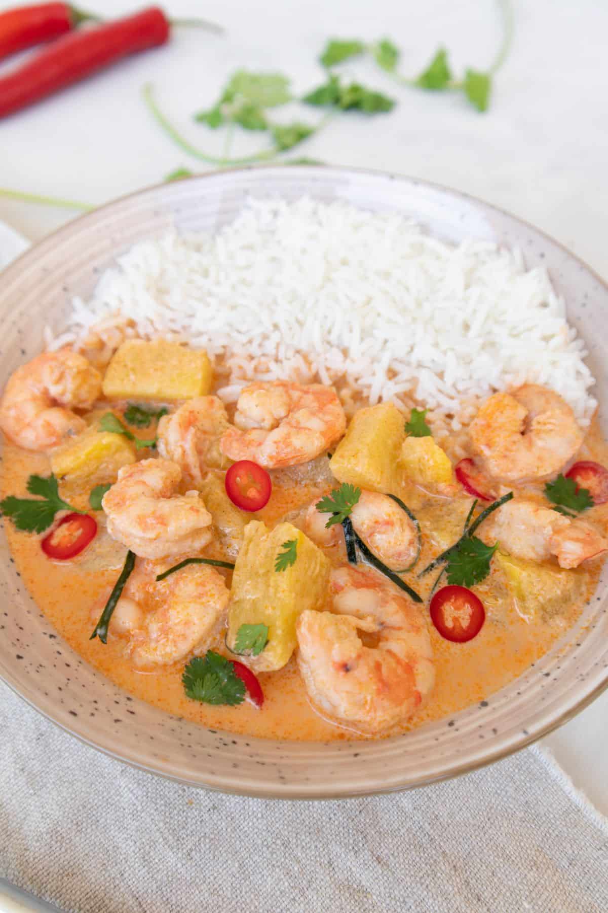 Creamy Thai Coconut Shrimp plated with white rice