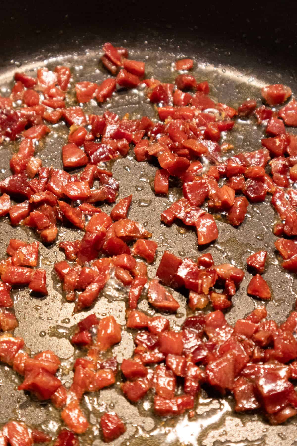 Diced Spanish ham chopped browning