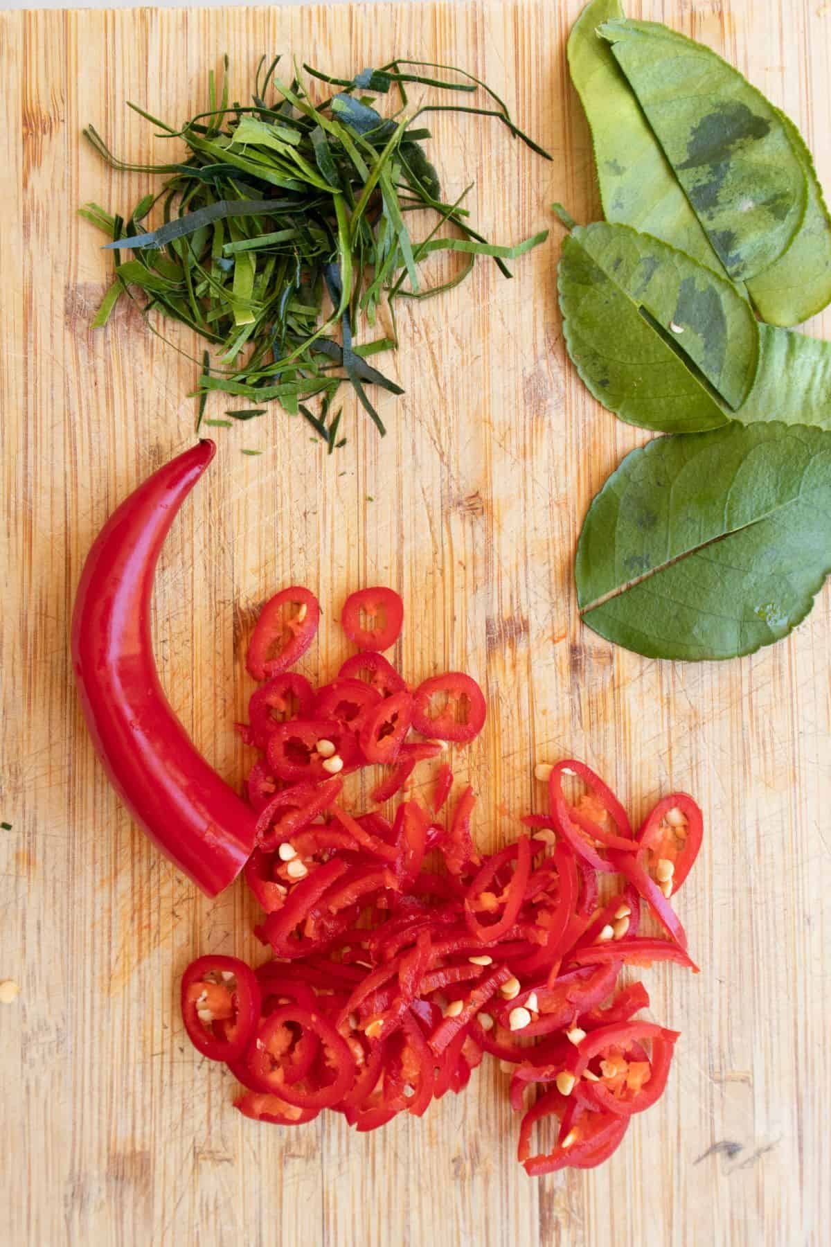 chilies and kaffir lime leaves cut