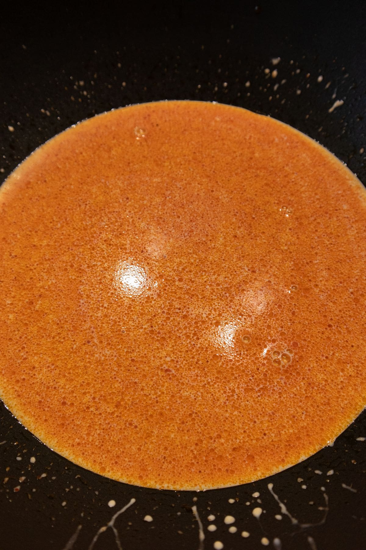 red curry paste combined with coconut milk